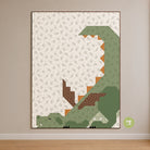 Framed dinosaur artwork on a wall with a patterned background