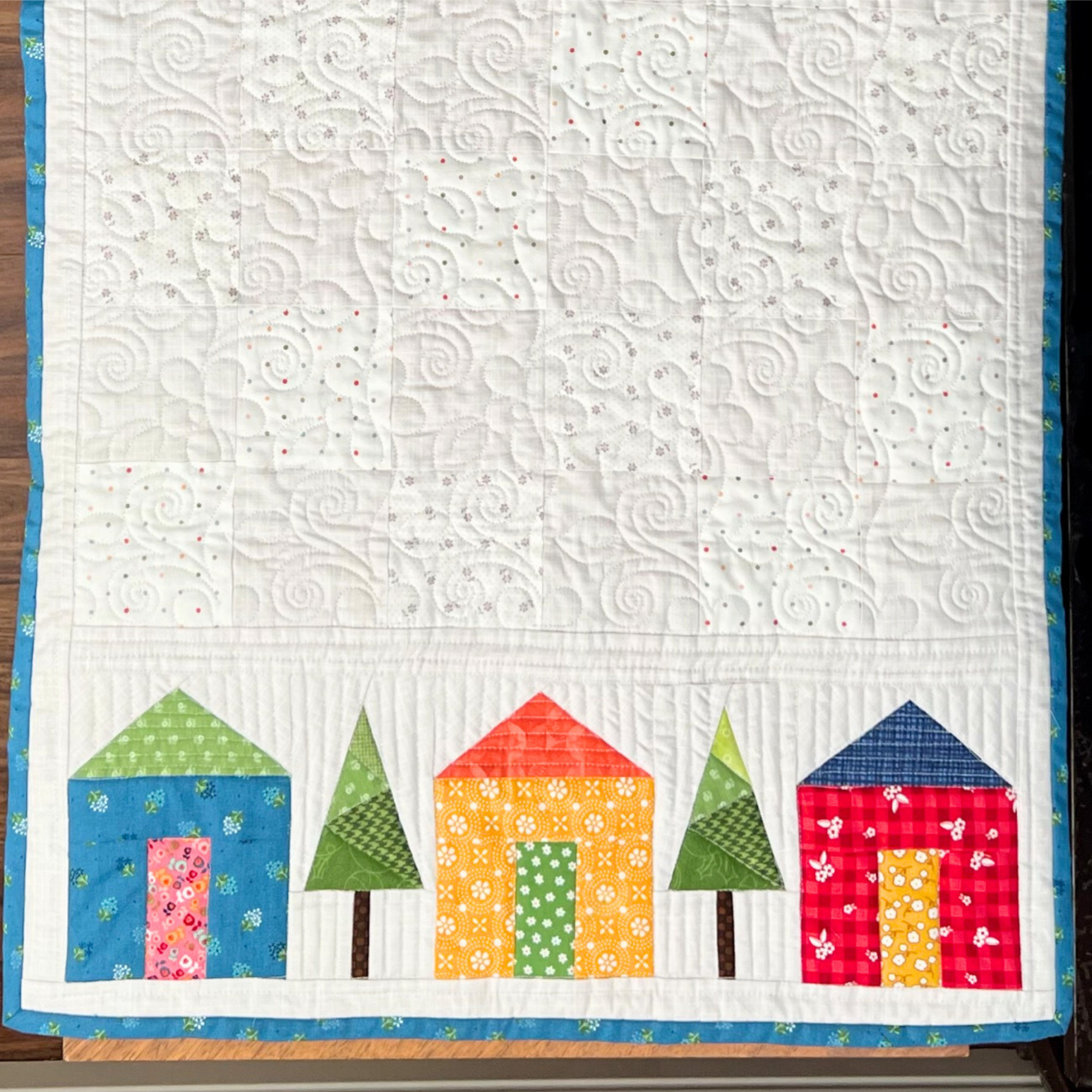 Downloadable pattern design with houses and trees